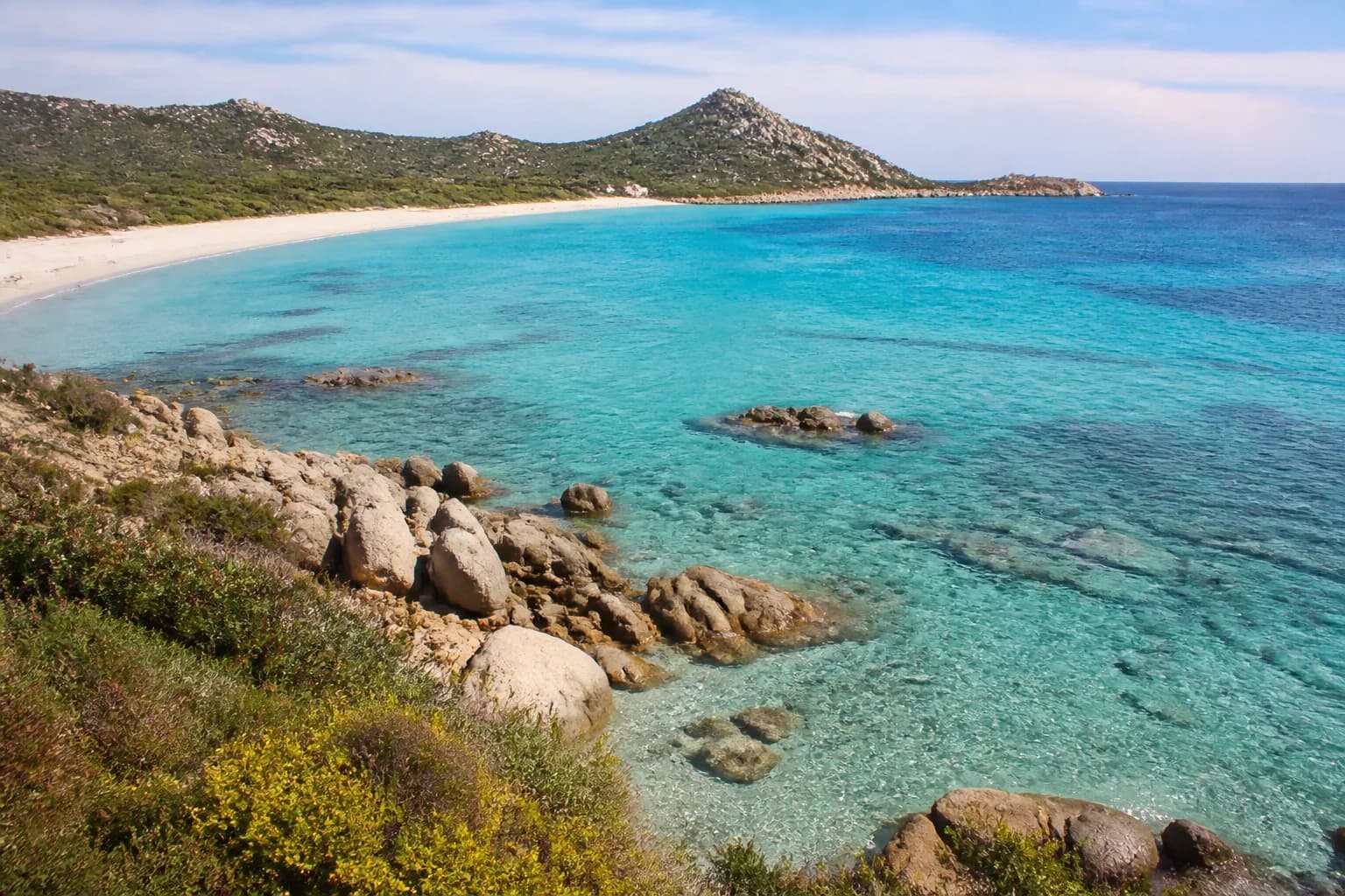 Clear sea and pale sand along the Villasimius coast
